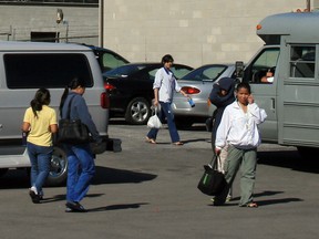 Migrant workers at Presteve Foods Ltd. are shown in this 2008 file photo. (Gary Rennie / The Windsor Star)