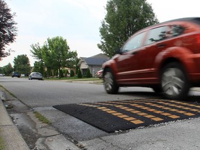 In this file photo, vehicles pass over a speed bump on Bellagio Drive in Windsor, Ontario on July 16, 2013. (JASON KRYK/The Windsor Star)