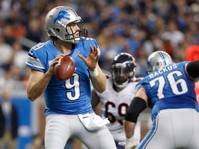 Detroit QB Matthew Stafford looks to throw against Chicago Bears at Ford Field last season in Detroit. The Lions signed Stafford to a three-year extension. (Gregory Shamus/Getty Images)