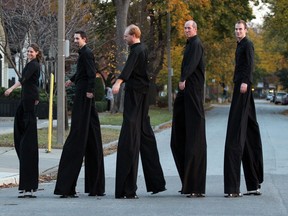 Mark Lefebvre of the Stilt Walking Guys, second from right, will hold a stilt walking class during the Windsor Public Library’s summer program which begins  Monday, July 8 at the Central Library, 850 Ouellette Ave.  (NICK BRANCACCIO / Windsor Star files)