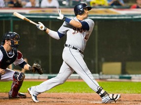 Detroit's Victor Martinez hits a two RBI double during the 10th inning against the Cleveland Indians at Progressive Field on July 8, 2013 in Cleveland. (Jason Miller/Getty Images)