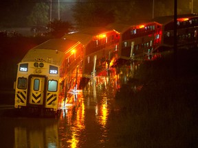 A standed and flooded GO Train is seen in Toronto late Monday night, July 8, 2013. THE CANADIAN PRESS/Frank Gunn