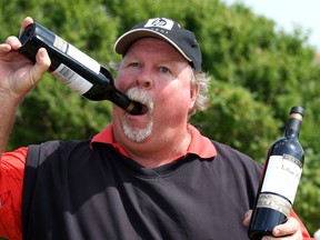 Craig Stadler celebrates his hole in one on the famous Postage Stamp par three hole. He won 123 bottles of wine from Hardys, the European Seniors Tour Offical Wine Suppliers, during the first round of the Senior Open Championships at Royal Troon on July 24,2008 in Troon,Scotland. In 1987, Stadler was penalized one stroke because he put a towel on muddy ground to hit a ball that had landed under a tree.
(Getty Images files)