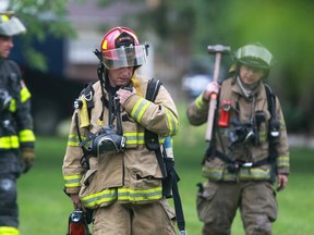 Windsor Fire and Rescue respond to a house fire at 2468 St. Patricks Ave., Saturday, Aug. 31, 2013.  (DAX MELMER/The Windsor Star)