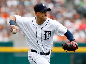 Third baseman Jose Iglesias of the Detroit Tigers throws out Dayan Viciedo of the Chicago White Sox at first base on a grounder in the first inning at Comerica Park on August 4, 2013 in Detroit. (Duane Burleson/Getty Images)