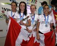 Team Windsor-Essex members Kendra Polewski, left, Zoe Mercier, Madeleine McDonald and Rachel Rode at  nternational Children's Games where they won silver in the pool, 4 x 100 relay, Friday August 16, 2013.   (NICK BRANCACCIO/The Windsor Star)
