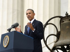 US President Barack Obama delivers remarks in front of a freedom bell during the "Let Freedom Ring" commemoration event August 28, 2013 in Washington, DC. The event was to commemorate the 50th anniversary of Dr. Martin Luther King Jr.'s "I Have a Dream" speech and the March on Washington for Jobs and Freedom.  (Photo by Michael Reynolds-Pool/Getty Images)