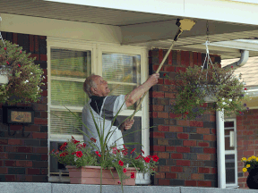 Canadian Navy veteran Steve Chaborek on the front porch of his well-maintained property on Indian Road.  Chaborek has lived in the home for over 50 years. Photo taken Monday August 19, 2013.  (NICK BRANCACCIO/The Windsor Star)