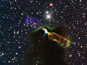 This handout image received on August 19, 2013, shows the newly discovered Herbig-Haro object HH 46/47, a newborn star with a large energetic jet moving away from our solar system (orange and green, lower right) which is invisible and hidden due to dust and gas, and a visible part of the jet streaming partly towards us (in pink and purple, left). The image was created by combining radio observations made by the Atacama Large Millimeter/submillimeter Array (ALMA) with shorter wavelength visible light observations from ESOs New Technology Telescope (NTT). AFP PHOTO / EUROPEAN SOUTHERN OBSERVATORY
