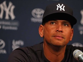 Alex Rodriguez of the New York Yankees speaks to the media before the Yankees/Chicago White Sox game at U.S. Cellular Field on August 5, 2013 in Chicago.  (Jonathan Daniel/Getty Images)