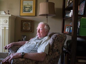 Michael McAteer is pictured in his Toronto home on Thursday, July 11, 2013. The former journalist, originally from Ireland, is one of three would-be citizens challenging the requirement to swear an oath of allegiance to the Queen. (THE CANADIAN PRESS/Chris Young ORG)