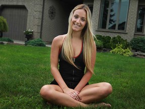Holly Holmes, 21, who is competing to join the Toronto Raptors Dance Pak, is pictured at her home in LaSalle, Ont., Monday, August 5, 2013.  (DAX MELMER/The Windsor Star)