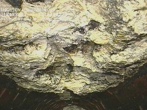 In this undated image released by Thames Water company, showing part of a 15-ton lump of fat and other debris coagulated inside a main London city sewer, which they have spent many days clearing from the drain, it was announced Tuesday Aug, 6, 2013. Utility company Thames Water says it has cleared what it calls the biggest "fatberg" ever recorded in Britain, a 15-ton blob of congealed fat and baby wipes the size of a bus, which was lodged inside a London sewer drain. (AP Photo/Thames Water)