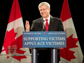 Prime Minister Stephen Harper answers questions about marijuana smoking at an event in Toronto on Thursday August 29, 2013. THE CANADIAN PRESS/Frank Gunn