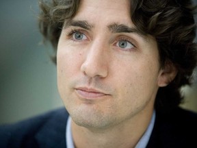 In this file photo, Justin Trudeau, son of former Canadian Prime Minister Pierre Trudeau,  is seen in this October 12, 2008 file photo during an interview in his campaign office in Montreal.  Canada's Liberal leader and strong candidate for prime minister, admitted on August 22, 2013 that he has smoked marijuana since being elected to parliament, after recently calling for legalizing its use. Trudeau told the Huffington Post that he smoked pot five or six times in his life, the first while on a trip to the Caribbean with university classmates and most recently three years ago with friends over for a dinner party while his children were staying overnight with their grandmother.  (AFP PHOTO/David BOILYDAVID BOILY/AFP/Getty Images)