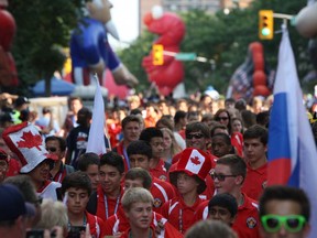 Athletes from around the world walk in the athletes parade before the closing of the International Children's Games, Sunday, August 18, 2013. (DAX MELMER/The Windsor Star)