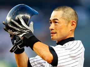 New York's Ichiro Suzuki bows to the fans after hitting a single, his 4,000 career hit in the first inning against the Toronto Blue Jays Wednesday. (Photo by Rich Schultz/Getty Images)
