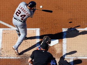 Detroit's Miguel Cabrera hits a single against the New York Mets at Citi Field Saturday in New York. (Photo by Jim McIsaac/Getty Images)