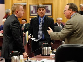 Files: Steve Vlachodimos, left, speaks with councillors Fulvio Valentinis, right, and Alan Halberstadt prior to council meeting Monday January 4, 2010. (NICK BRANCACCIO/The Windsor Star)