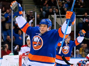 Windsor's Matt Martin celebrates a goal on Montreal goaltender Carey Price at the Nassau Coliseum in Uniondale, N.Y. (AP Photo/Paul J. Bereswill)