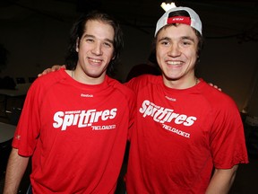 Spits forward Alex Aleardi, left, welcomes Alex Khokhlachev back to the team last year. (NICK BRANCACCIO/The Windsor Star)