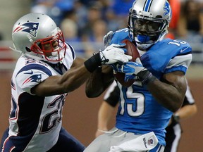Detroit Lions wide receiver Micheal Spurlock, left, makes a catch as New England Patriots defensive back Logan Ryan (26) defends in the fourth quarter of a pre-season game in Detroit. (AP Photo/Duane Burleson)