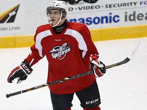 Spits defenceman Patrick Sieloff takes a break at practice at the WFCU Centre last year. (TYLER BROWNBRIDGE/The Windsor Star)