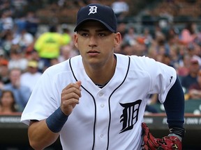 Detroit's Jose Iglesias runs onto the field at the start of the game against the Chicago White Sox at Comerica Park Friday. (Photo by Leon Halip/Getty Images)