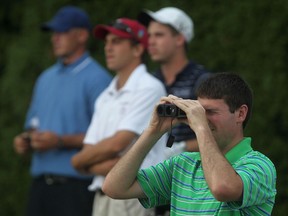 Sarnia's Graham Hill, right, scopes out the third hole in the 2012 Western Ontario Amateur at Beach Grove. (DAX MELMER/The Windsor Star)