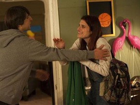 Demetri Martin, left, and Lake Bell, in a scene from the film "In a World...," a comedy about a struggling voice coach. (Associated Press/Bonnie Osborne/Roadside Attractions)
