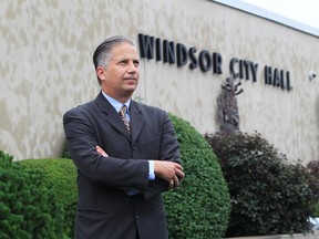 Ward 7 hopeful Angelo Marignani stands in front of Windsor City Hall on July 10, 2013. (Jason Kryk / The Windsor Star)