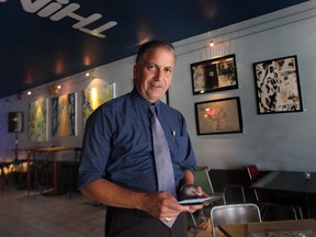 Angelo Marignani poses Wed. Aug. 28, 2013, at his downtown Windsor, Ont. business, the Milk Coffee Bar. Marignani, who finished second to Percy Hatfield in ward 7 city council race would like to fill the now vacant seat.  (DAN JANISSE/The Windsor Star)