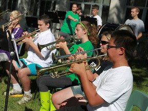 Members of the 4th W.F. Herman Summer Band Camp perform outside Herman Secondary School, Friday, August 23, 2013.   (DAX MELMER/The Windsor Star)