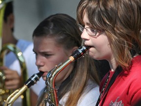 Members of the 4th W.F. Herman Summer Band Camp perform outside Herman Secondary School, Friday, August 23, 2013.   (DAX MELMER/The Windsor Star)