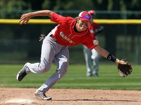 Windsor-Essex's Jarrod Beens chases a ground ball off a Detroit hitter on the first day of the International Children's Games at Cullen Field in Windsor Thursday, August 15, 2013. (TYLER BROWNBRIDGE/The Windsor Star)
