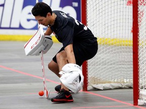 Montreal Canadiens goalie Carey Price makes a stop during a ball hockey training session at the national men's team orientation camp in Calgary, Alta., Monday, Aug. 26, 2013.THE CANADIAN PRESS/Jeff McIntosh