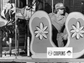 Scott Guest, 16, relaxes on the ride he helped assemble at a carnival on June 26, 1979. (BEV MacKENZIE/The Windsor Star)