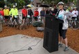 Marlaine Koehler, executive director of the Waterfront Regeneration Trust, addresses cyclists before they head out on a ride to Leamington as part of the Great Waterfront Trail Adventure in Windsor on Monday, August 12, 2013. The group is following Ontario's Waterfront Trail which recently expanded from 780 km to 1400 km.            (TYLER BROWNBRIDGE/The Windsor Star)