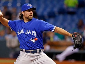 Jays starter R.A. Dickey pitches against the Tampa Bay Rays during the game at Tropicana Field on August 16, 2013 in St. Petersburg, Florida.  (Photo by J. Meric/Getty Images)