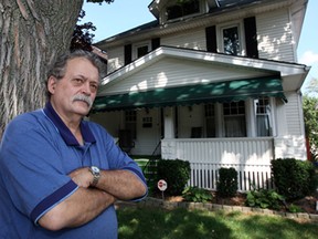 Tom Hamilton has fond memories of his childhood on Moy Avenue.  Now, Hamilton is selling the family home and he hopes the new owners will love the house just as much as he did, Friday August  30, 2013. (NICK BRANCACCIO/The Windsor Star)