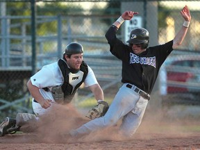 Tecumseh's Derrick Fortier, right, is tagged out by Windsor Selects catcher Laszlo Horvath during regular-season action at Cullen Field. Monday, Fortier hit a three-run homer against the Selects to clinch the Ontario junior final in Burlington. (DAN JANISSE/The Windsor Star)