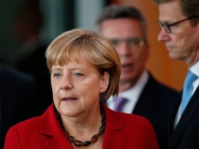 German Chancellor Angela Merke arrives for the weekly cabinet meeting at the chancellery in Berlin, Germany, Wednesday, Aug. 28, 2013. (Associated Press/Michael Sohn)