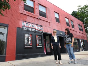 The former Knights of Columbus building in the 700 block of Ouellette Ave. recently received heritage designation. A group is launching a $1-million fundraising effort to convert the facility into a film and arts centre. Amanda Gellman (L), an investor in the building and member of the Windsor Centre for Film, Digital Media and Creative Arts board poses in front of the building with fellow board member Jessica Cook.