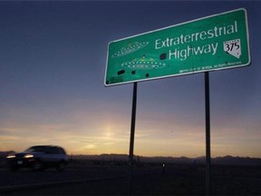 A car moves along State Route 375, the "Extraterrestrial Highway" that runs near Area 51. The CIA is finally acknowledging the existence of Area 51 in newly declassified documents. (Associated Press/Laura Rauch)