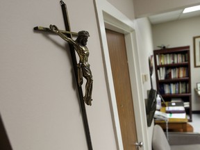 One of hundreds of crucifixes is seen on a wall at Hotel Dieu Grace Hospital in Windsor on Thursday, August 22, 2013. The hospital is removing all the religious items from the hospital. Some will be moved to the  Tafour Campus while other will be stored in the archive.         (TYLER BROWNBRIDGE/The Windsor Star)