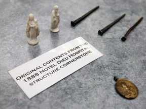 A collection of items found in a cornerstone is seen at Hotel Dieu Grace Hospital in Windsor on Thursday, August 22, 2013. The hospital is removing all the religious items from the hospital. Some will be moved to the  Tafour Campus while other will be stored in the archive.         (TYLER BROWNBRIDGE/The Windsor Star)