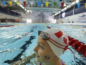 Canadian Jessica McConnell warms up before afternoon swimming competitions at the International Children's Games being held at the Windsor International Aquatic and Training Centre,  Friday, August 16, 2013.  (DAX MELMER/The Windsor Star)
