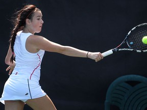 Team Canada's Silvia Verebes of Windsor, Ont. returns a shot during a match Thursday, Aug. 15, 2013, against Taja Glazer of Slovenia at the International Children's Games in Windsor, Ont. (DAN JANISSE/The Windsor Star)