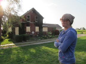 Homeowner Monique McCormick talks about how she bought her home because it was 150 years old and she’s a “stickler for old things.” Her home at 1600 Heritage Dr. in Kingsville was gutted by fire on Wednesday, Aug. 7, 2013. (Monica Wolfson/The Windsor Star)