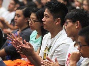 Newly arrived immigrant students participate in a orientation session Thursday, Aug. 29, 2013, at the Catholic Central High School in Windsor, Ont. (DAN JANISSE/The Windsor Star)